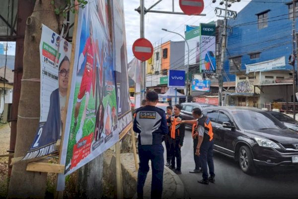 Halangi APILL, Dishub Makassar Turunkan Spanduk