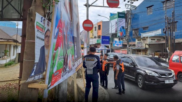 Halangi APILL, Dishub Makassar Turunkan Spanduk